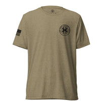 Olive shirt, front view showing JSOC chest insignia.