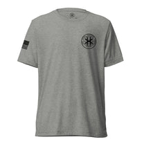 Athletic grey shirt, front view showing JSOC chest insignia.