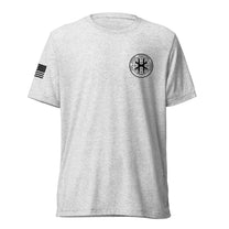 White fleck shirt, front view showing JSOC chest insignia.