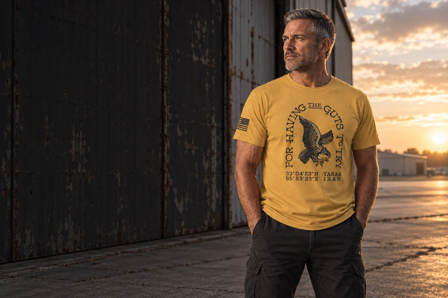Mature man wearing the Guts to Try design at a hangar doorway — campaign illustration